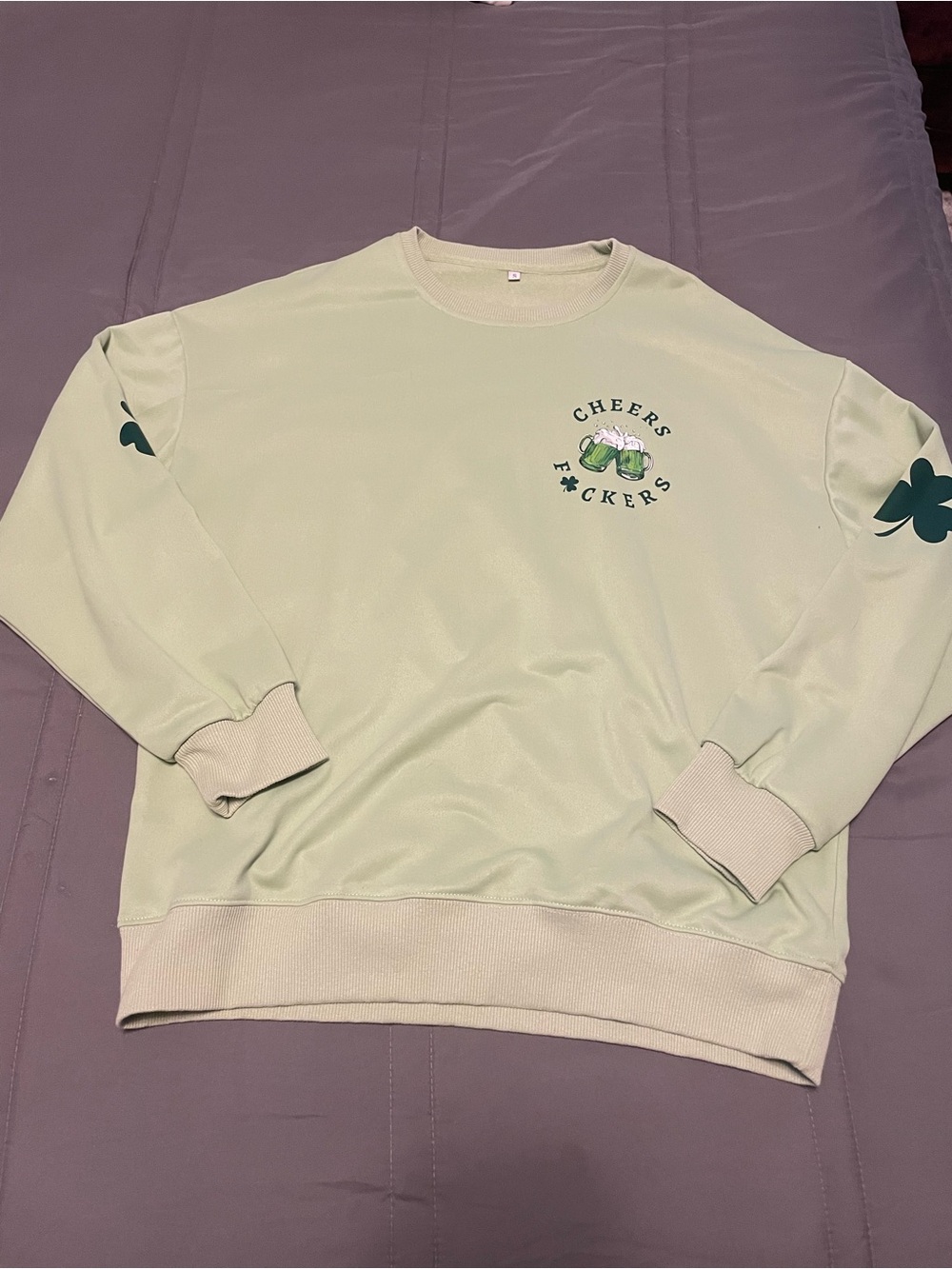 Amazon Light Green Crewneck Sweatshirt with Clover Graphic
